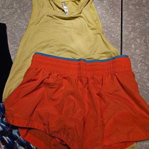 Fabletics XS bundle! Two tanks (muscle/open-back) and two shorts! - Picture 8 of 13